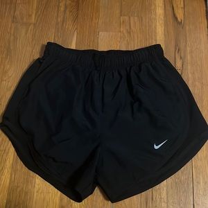 Black Nike running shorts